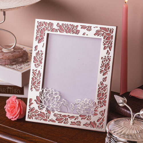a delicate frame with silver plate floral design, handcrafted to perfection.