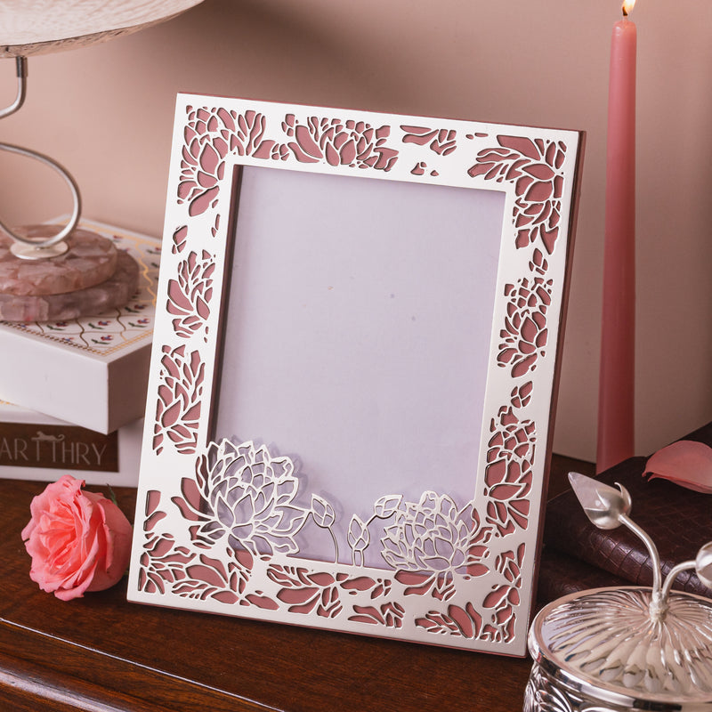 a delicate frame with silver plate floral design, handcrafted to perfection.