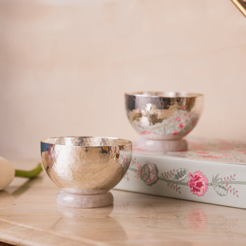 HandcraftCrafted with brass and plated with silver, these bowls are a beautiful gift. 